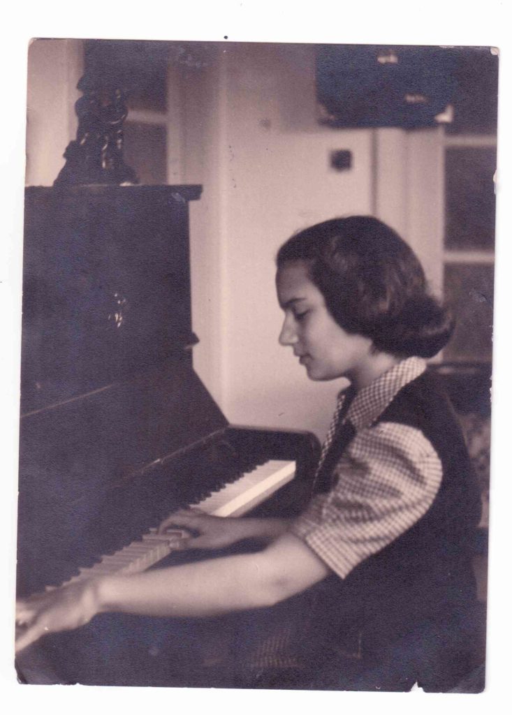 at the piano
